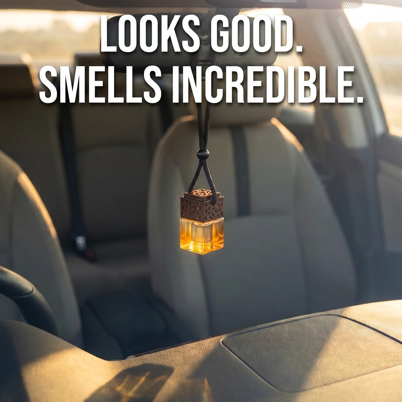 Amber FRESURE glass car diffuser in a car — looks good, smells incredible